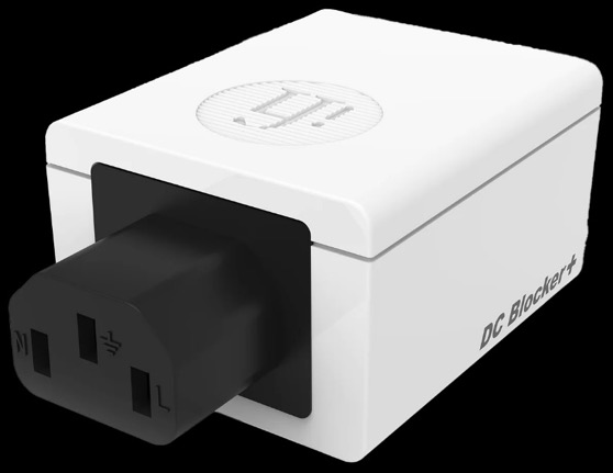 A white box with a black plug

Description automatically generated